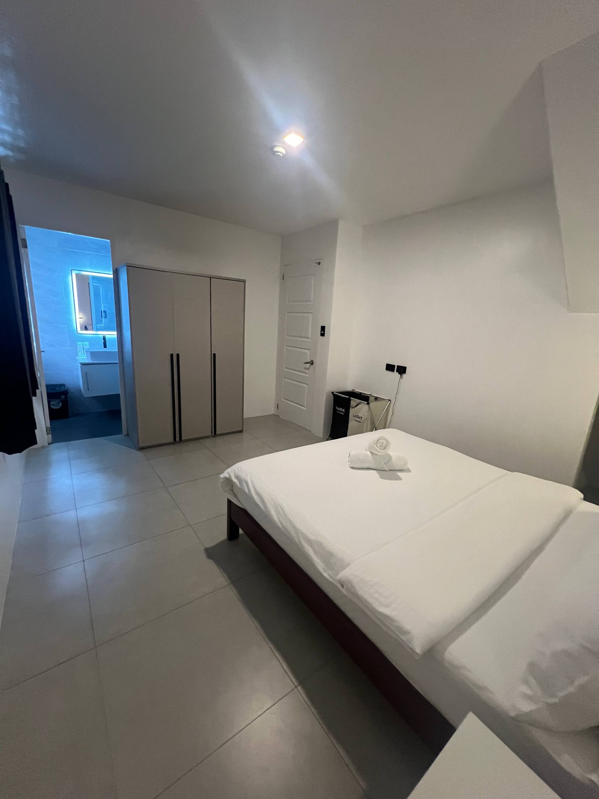 Bedroom 3 with wardrobe, en-suite doorway and blue lighting